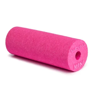 Rodillo Blackroll Mini rosado, vista frontal sobre fondo blanco