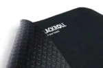 Detalle del mat Blackroll mostrando la textura antideslizante en ambas caras