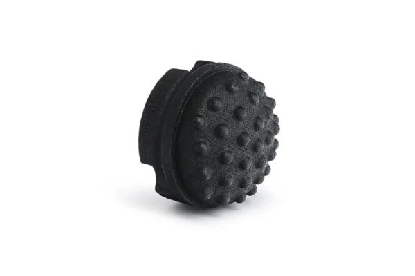 25158318719151 Blackroll Twister visto de perfil, pelota fascial negra con superficie de nudos