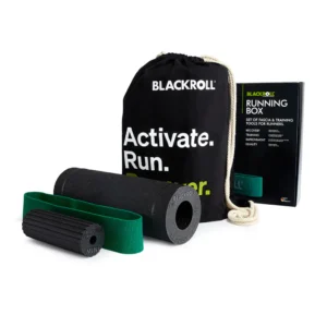 Kit Blackroll Running Box completo: bolso negro con el texto Activate Run, rodillo Slim, Mini Flow verde y Loop Band verde