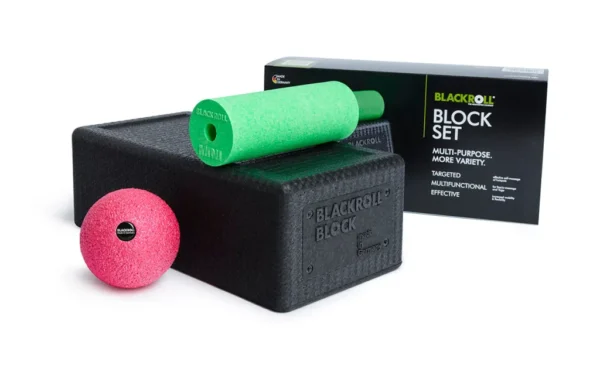Blackroll Block Set completo: bloque negro, rodillo Mini verde y Ball 08 rosada, junto a la caja del producto