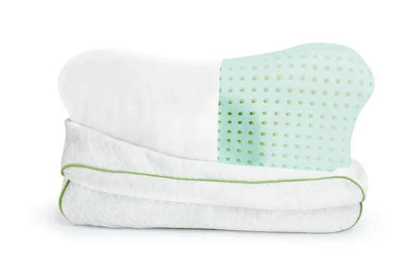 Blackroll Recovery Pillow doblada mostrando sus dos caras: textura blanca acolchada y textura verde menta con puntos de ventilación